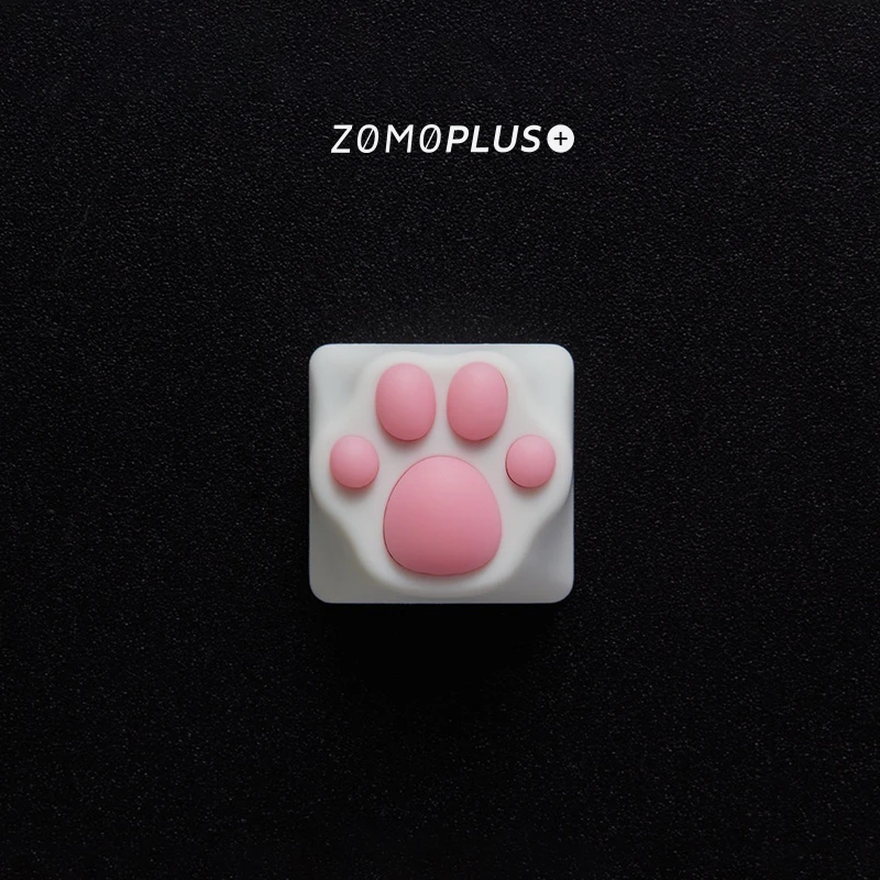 Crafted with an ABS base and UV coating, ZOMOPLUS White-Pink Kitty Paw Artisan Keycap offers bright, stable colors and a skin-like texture for prolonged use.