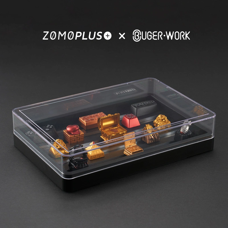 zomoplus-bugerwork-metal-keycap-box-crystal-clear-keycap-showcase Clear acrylic-topped ZOMOPLUS X BugerWork metal keycap box showcasing various artisan keycaps, offering enhanced visibility from all angles.