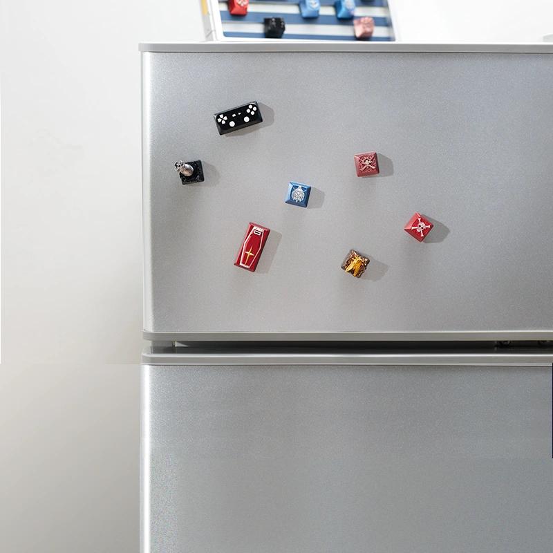ZOMOPLUS One Piece Metal Keycap Display & Storage Box Showcase the keycaps on a refrigerator or other magnetic surfaces using magnetic adapters included.