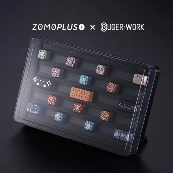 zomoplus-bugerwork-metal-keycap-storage-box-with-high-angle-vertical-display High-angle vertical display of keycaps in the ZOMOPLUS x BurgerWork Metal Storage Box with detachable feet