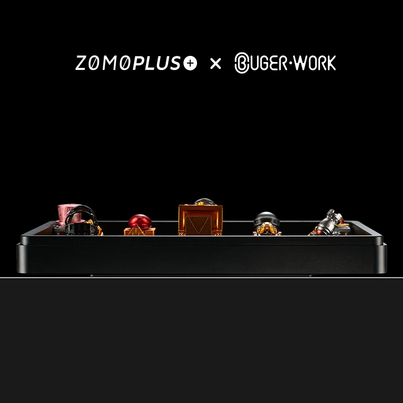 zomoplus-bugerwork-ultimate-variable-height-keycap-display ZOMOPLUS X BugerWork's metal keycap box with adjustable height compartments, displaying a variety of colorful and uniquely shaped artisan keycaps.