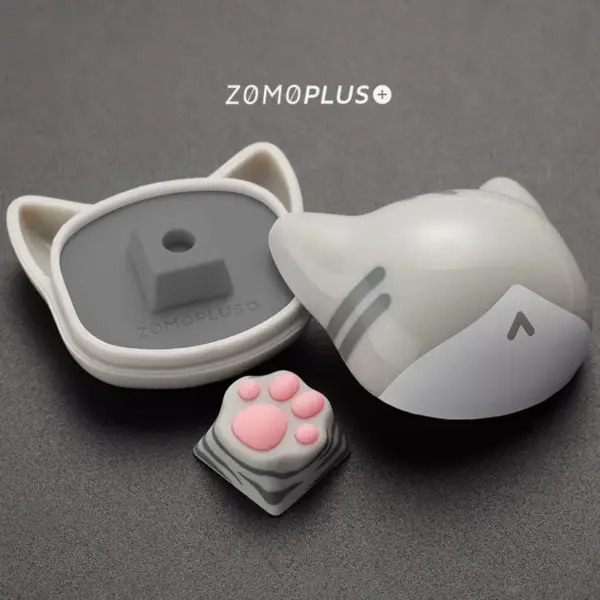 zomoplus-abs-silicone-kitty-paw-artisan-keycap-and-storage-box-american-shorthair ZOMOPLUS kitty paw keycap for American Shorthair lovers, made with durable ABS and soft silicone, packed in a custom storage box.