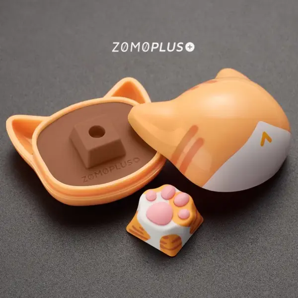 zomoplus-abs-silicone-kitty-paw-artisan-keycap-and-storage-box-orange-cat ZOMOPLUS ABS & Silicone kitty paw keycap and cute storage box featuring an orange cat design, designed for playful aesthetics.