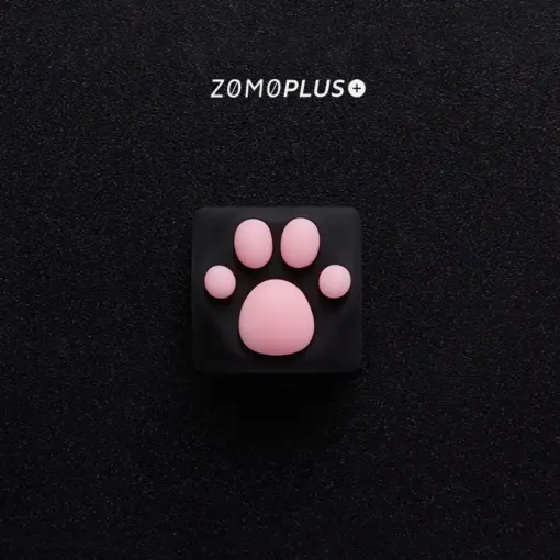 Close-up top view of ZOMOPLUS black-pink kitty paw keycap, emphasizing the soft silicone paw texture and strong ABS base.