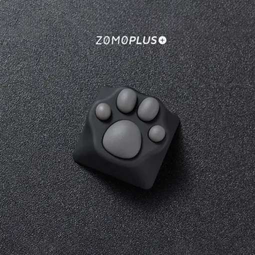 Zoomed-in view of the ZOMOPLUS kitty paw keycap, showcasing its artistry and the fun factor it brings to typing.