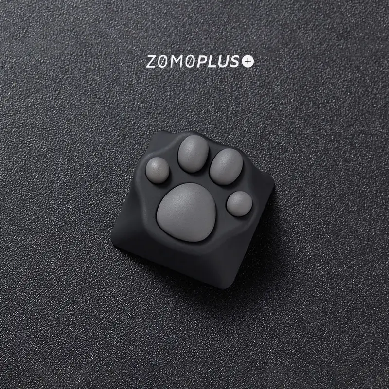 Zoomed-in view of the ZOMOPLUS kitty paw keycap, showcasing its artistry and the fun factor it brings to typing.