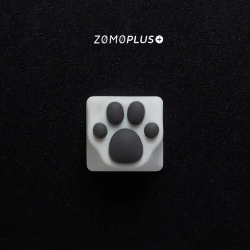 ZOMOPLUS kitty paw keycap in white-grey, viewed from above, with soft, bouncy silicone and durable ABS construction.