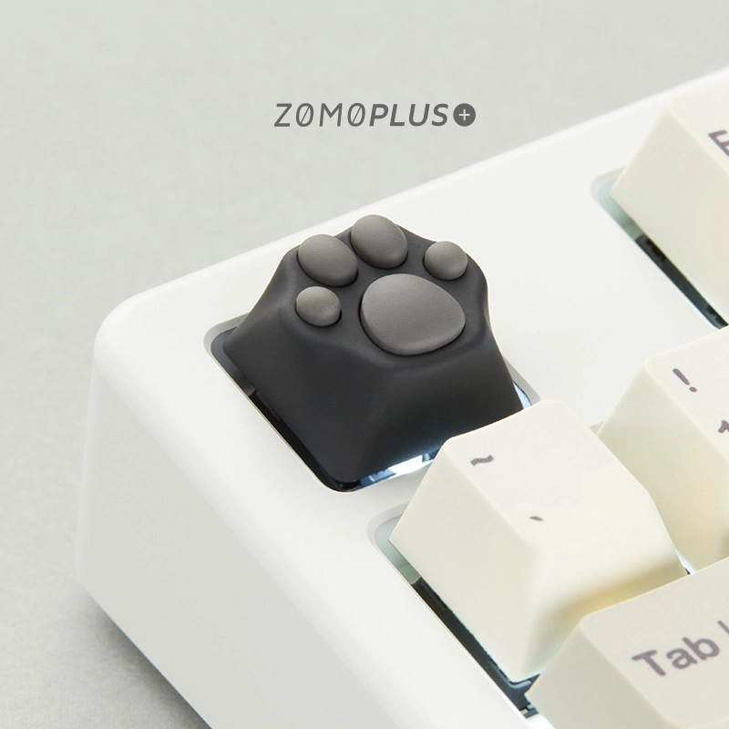 ZOMOPLUS black-grey kitty paw keycap enhances your keyboard's look while providing a playful touch.