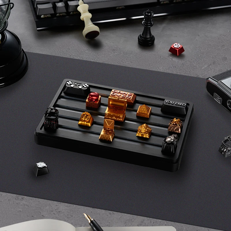 ZOMOPLUS x BUGERWORK Metal Keycap Storage Box ZOMOPLUS X BUGERWORK keycap storage box on desk, with artisan keycaps displayed neatly. Ideal for organized storage.