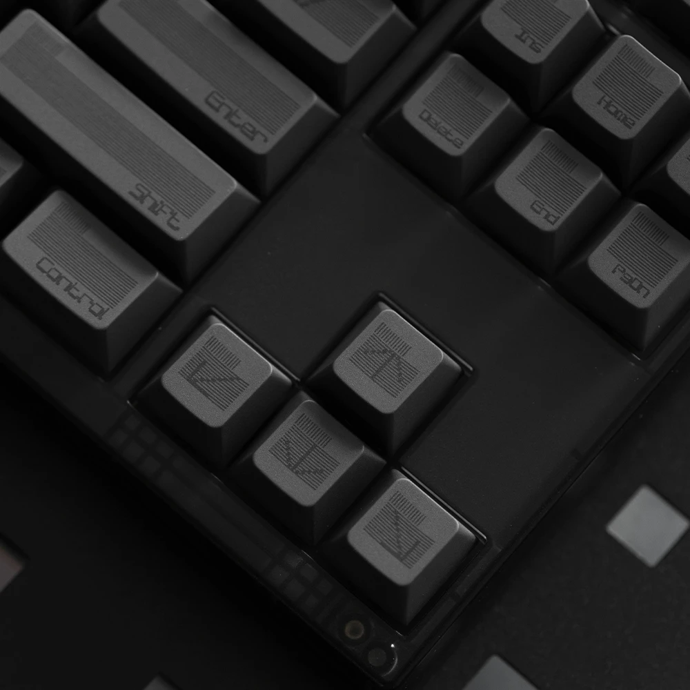 Five-sided dye-sub black keycap set featuring a sleek striped moire effect.
