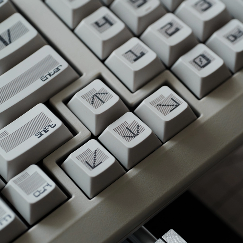 Moire Pattern White Retro keycap set with high-contrast legends and industrial aesthetics.
