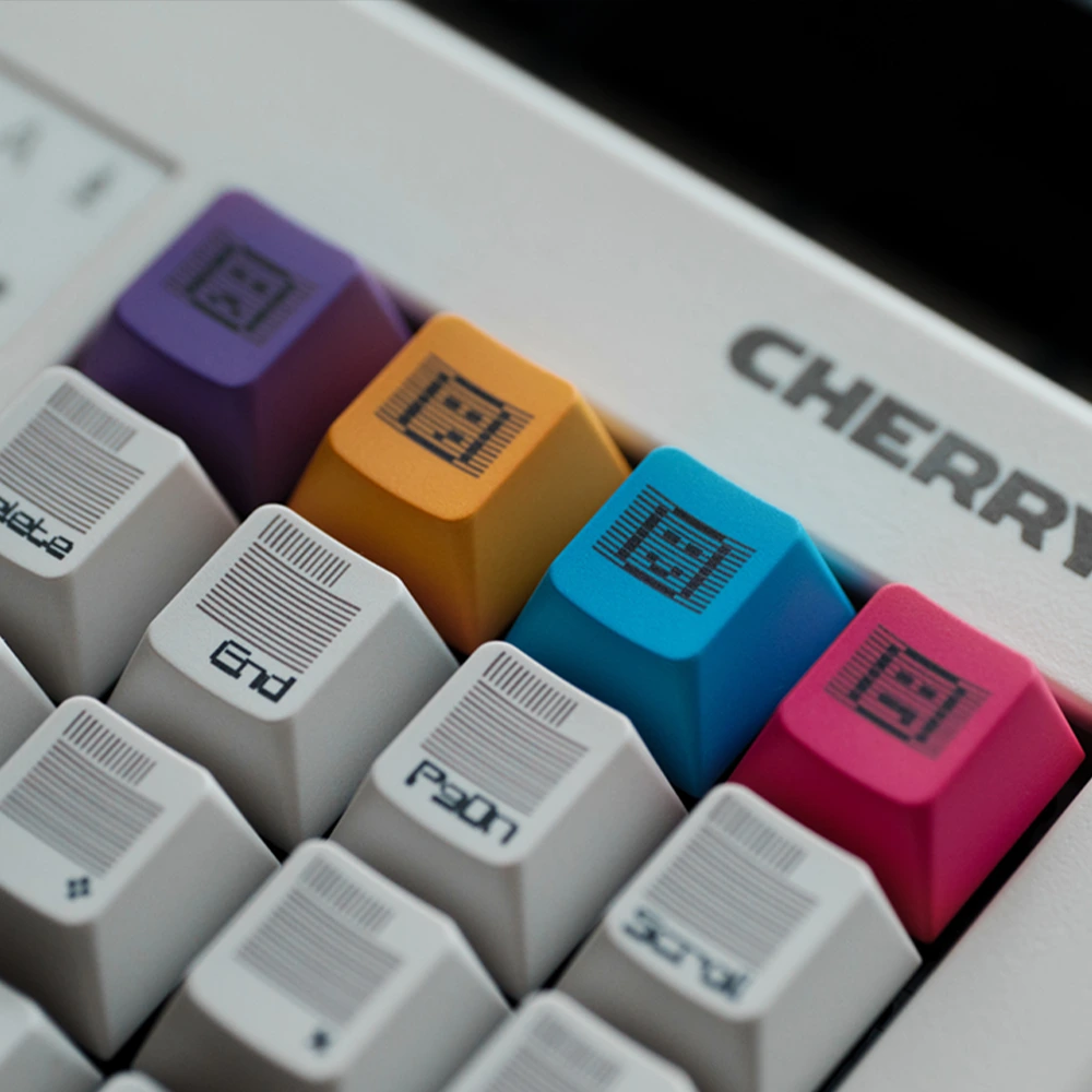 White Retro keycap set with colorful accent keys and pixel-style icons.