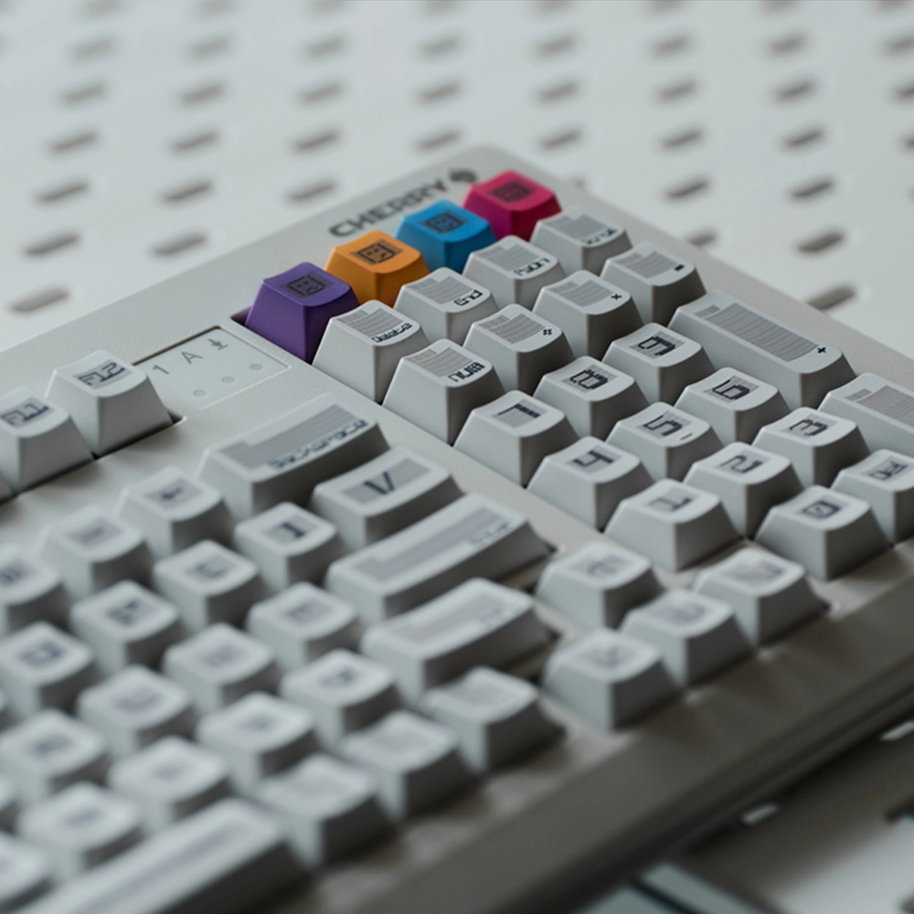 White Retro keycaps with colorful pixel-art accent keys for a bold look.