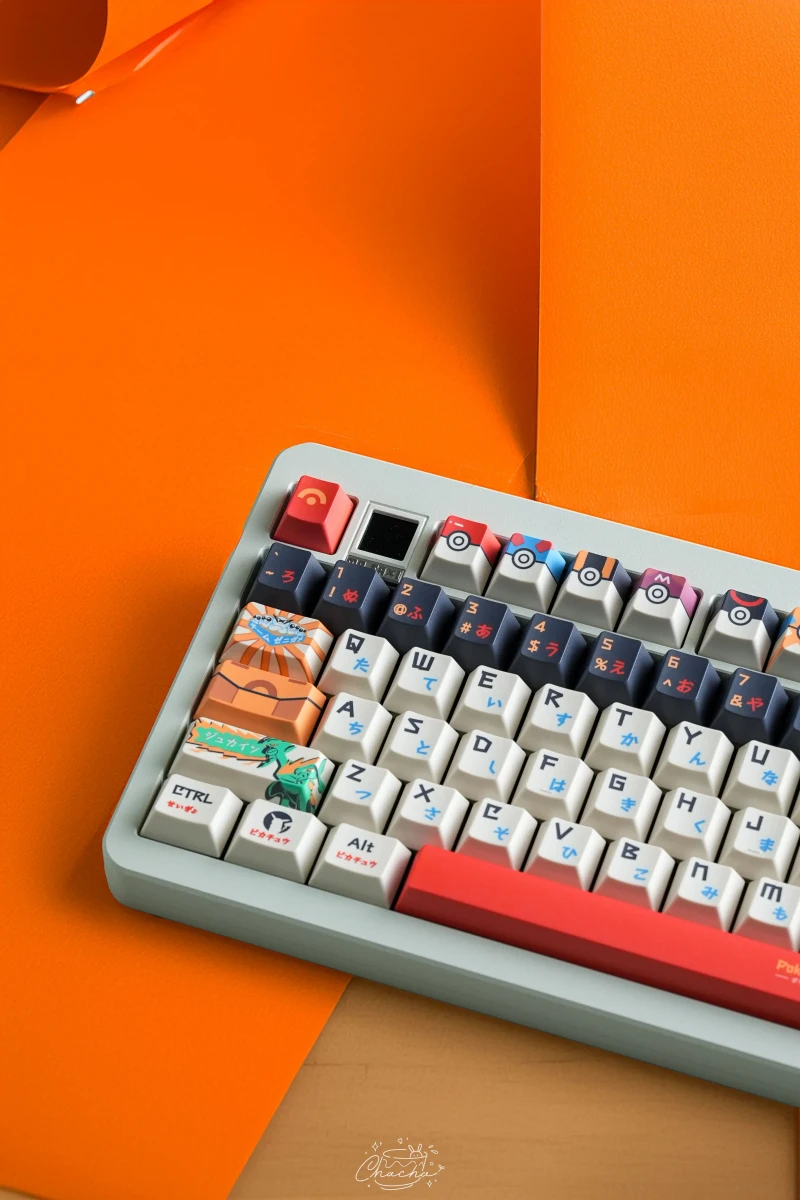 Pokemon Master Cherry Profile Keycaps Full Pokemon keycaps keyboard layout on vibrant orange background showing complete gaming setup with character keys and Pokeball design