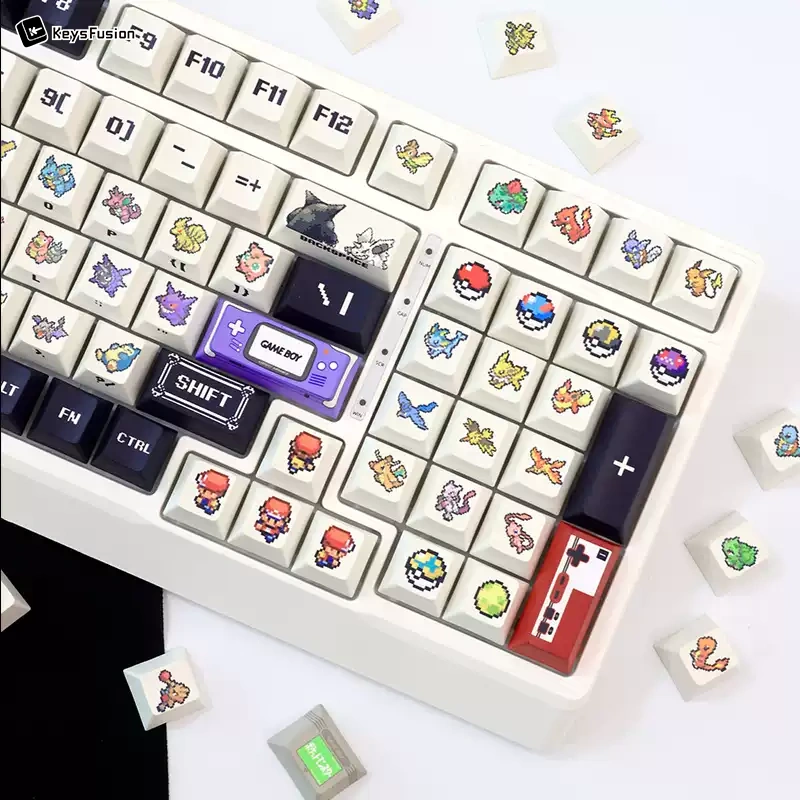 Angled view of Pokemon keycap keyboard showing detailed pixel art characters and retro gaming aesthetic