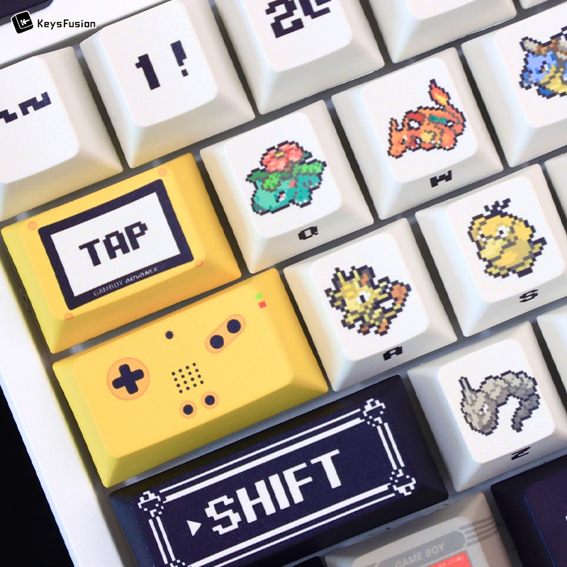 Pokemon keycaps detail showing yellow TAP key with starter Pokemon including Bulbasaur and other first-gen characters