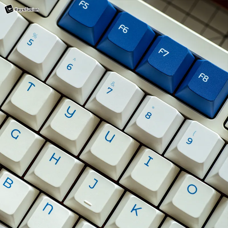 Close-up of SINOKEY White Rabbit Cherry profile keycaps showing blue F5-F8 function keys detail