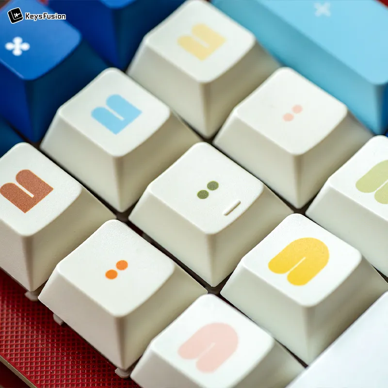 Macro shot of SINOKEY White Rabbit Cherry keycaps displaying various colorful candy-themed icons and designs