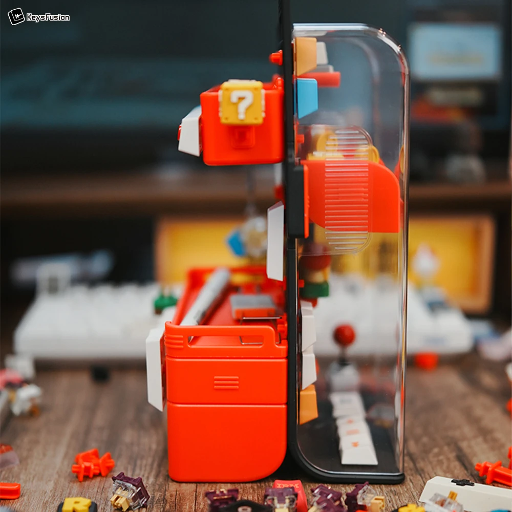 Double-Sided Vertical Keycap Storage Display | Gaming Collector's Dream Vertical keycap pegboard storage case with red frame and transparent cover displaying colorful gaming-themed keycaps on wooden desk.
