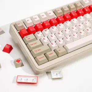Cherry Profile PBT keycaps close-up showing spherical sculpting dished tops and row height differences red and beige colorway
