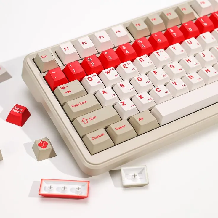 Cherry Profile Keycaps Guide: Why Enthusiasts Love Them (2026) Cherry Profile PBT keycaps close-up showing spherical sculpting dished tops and row height differences red and beige colorway