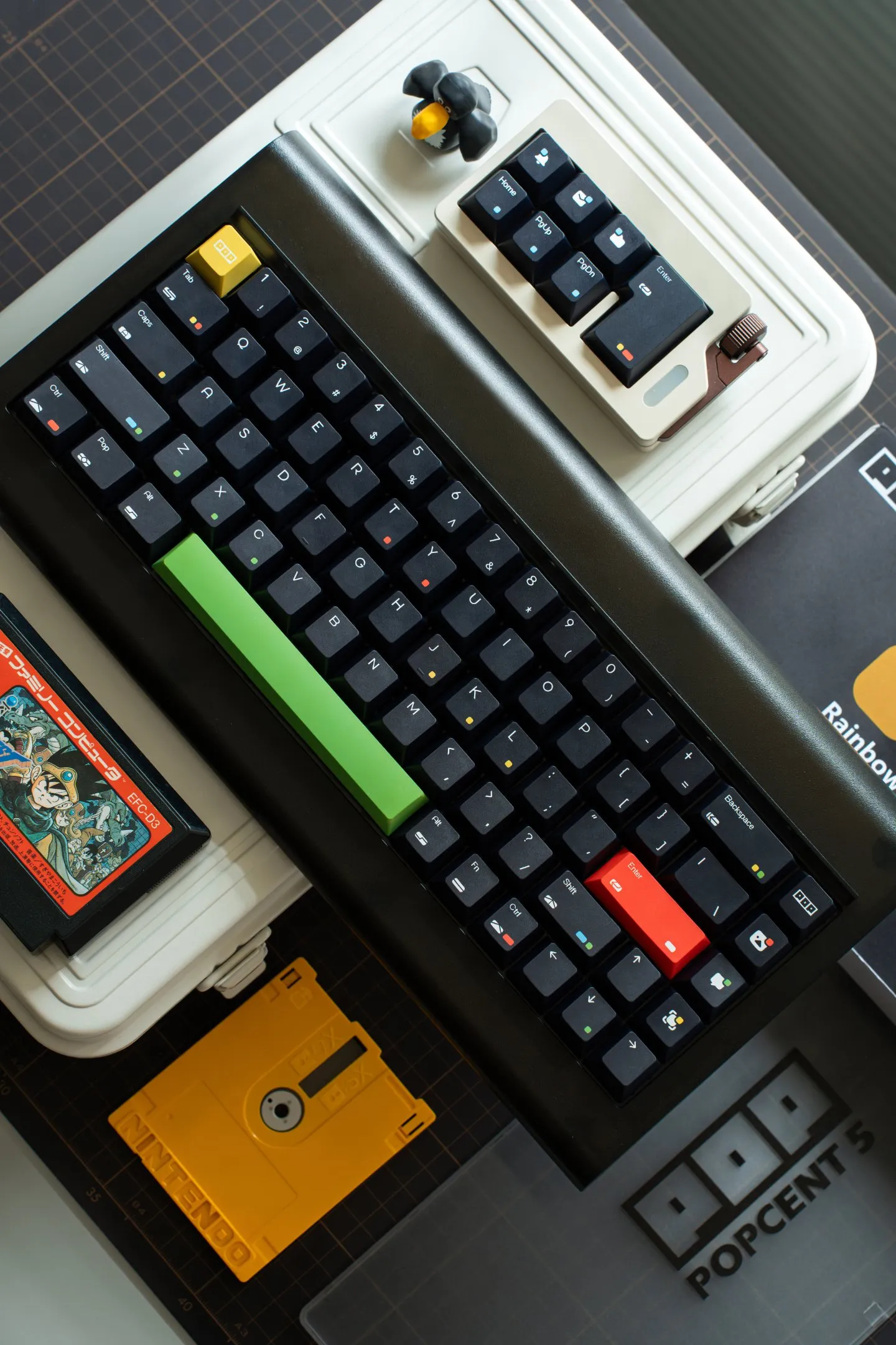 Rainbow Dot Cherry Profile Keycaps - Black Rainbow Dot black keycaps with green spacebar and vintage computer aesthetic flatlay