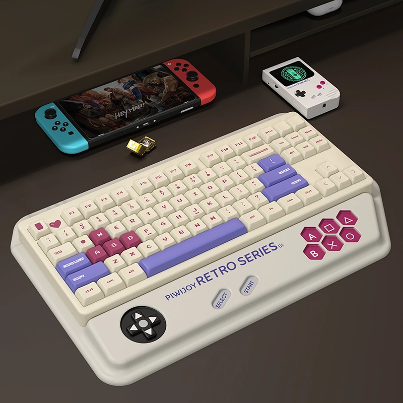 Gaming desk setup showing white retro console keyboard wrist rest for a complete nostalgic setup.