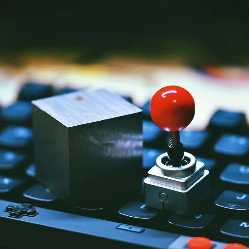 Retro Joystick Metal Artisan Keycap Metal joystick keycap showing CNC machined aluminum construction, solid block carving craftsmanship detail