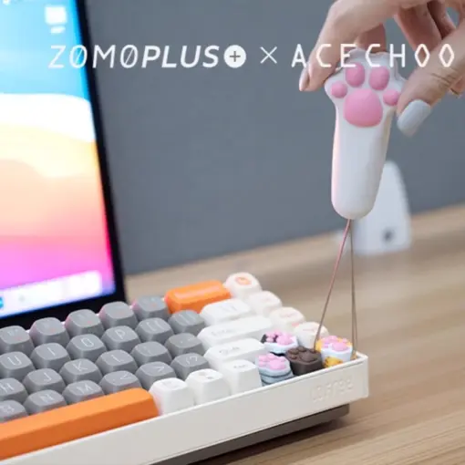 Cat paw keycap puller removing keycaps from mechanical keyboard with cute design