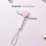 White fairy stick keycap puller with pink heart and angel wings detail