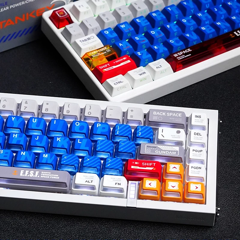 keysfusion-gundam-nuclear-power-cherry-profile-keycaps-2 Close-up of Gundam keycaps showing translucent red Shift key, blue alpha keys, and E.F.S.F. spacebar branding