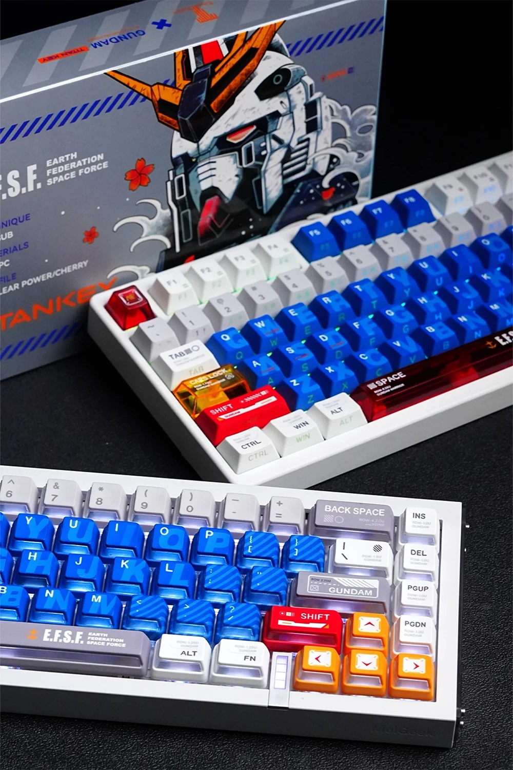 Gundam Nuclear Power & Cherry Profile Side-lit Keycaps Gundam Cherry profile side-lit keycaps mechanical keyboard with blue keys, white base, red shift key, and Gundam mecha artwork packaging in background