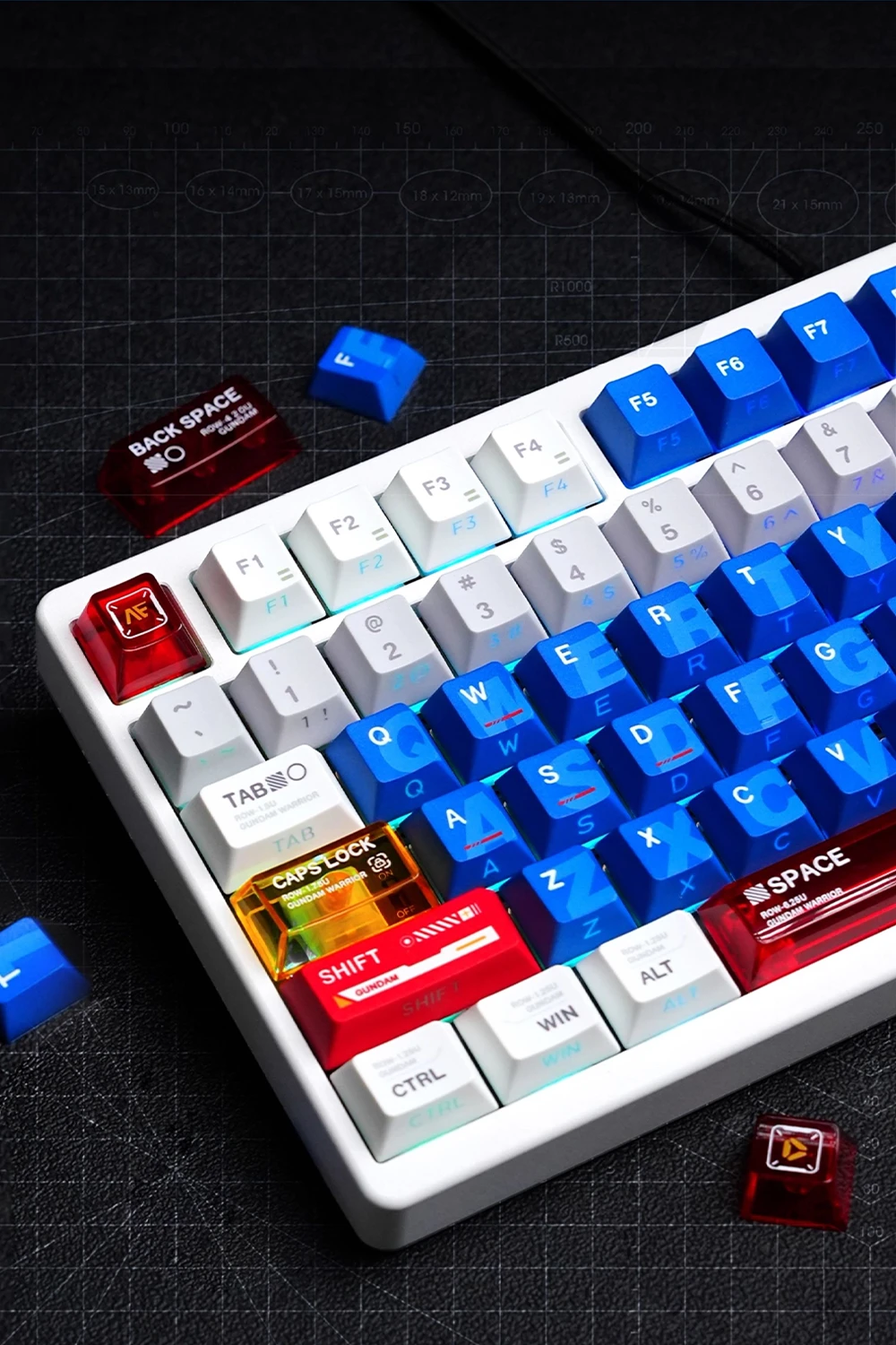 Gundam Nuclear Power & Cherry Profile Side-lit Keycaps Close-up of Gundam side-lit keycaps showing blue translucent keys, red backspace, orange caps lock with rainbow lighting effect on white mechanical keyboard
