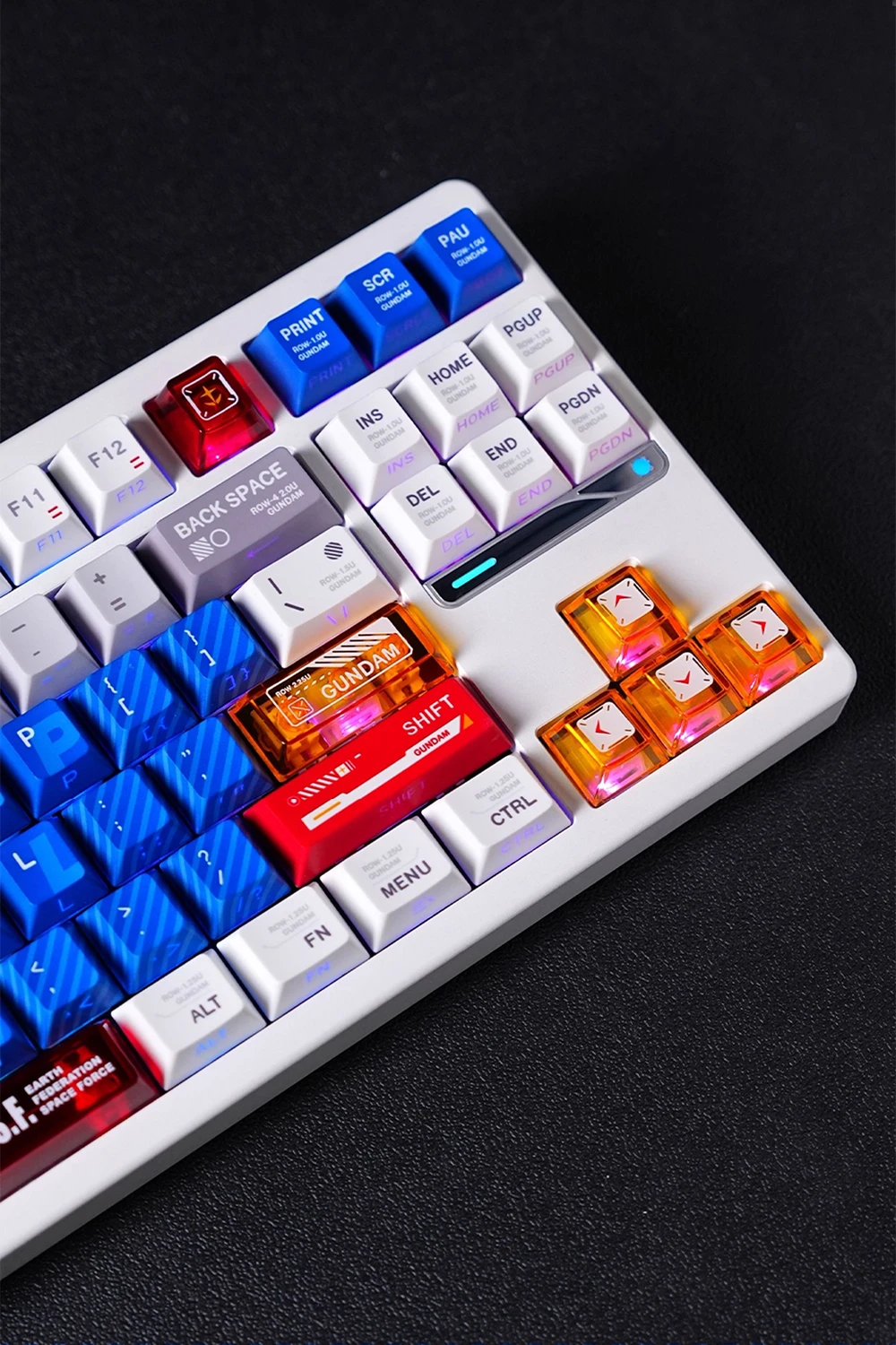 Gundam Nuclear Power & Cherry Profile Side-lit Keycaps Gundam Nuclear Power keycaps featuring blue translucent keys, orange arrow cluster, red shift key, and Gundam emblem with RGB side-lighting effects