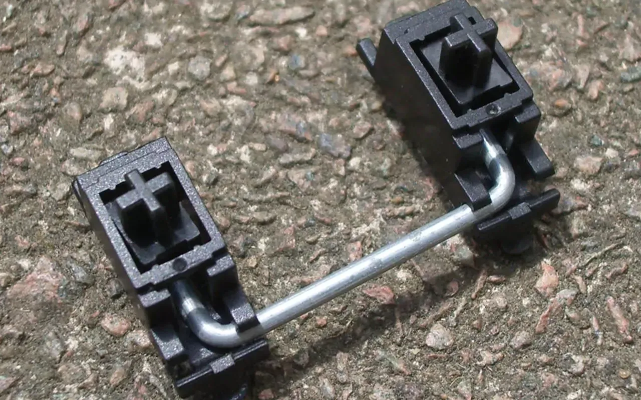 Cherry style stabilizer mechanism for spacebar shift enter keycaps