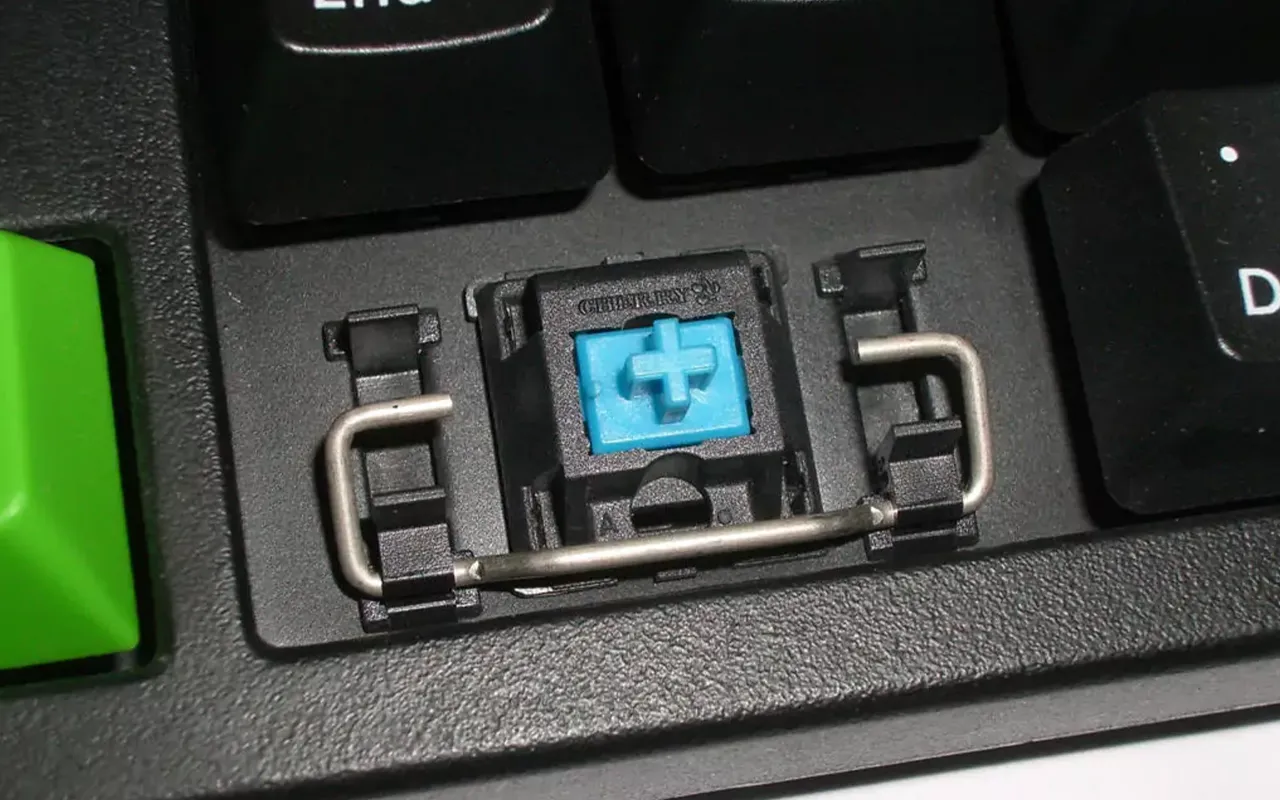 Costar stabilizer with wire clips showing keycap insert compatibility
