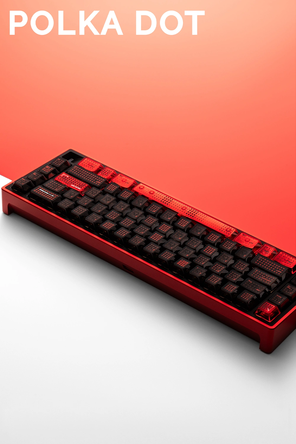 Polka Dot PC Translucent Cherry Profile Keycaps – Red-Black Red and black translucent polka dot keycaps on red keyboard with glowing effect