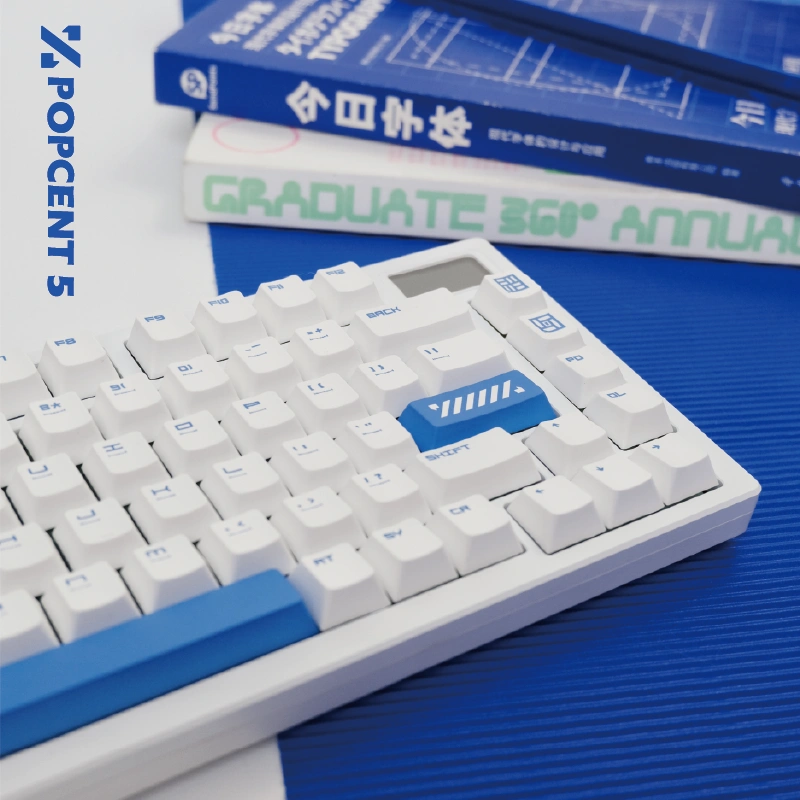 Close-up blue keycaps with diagonal stripe accents on Cherry profile keyboard