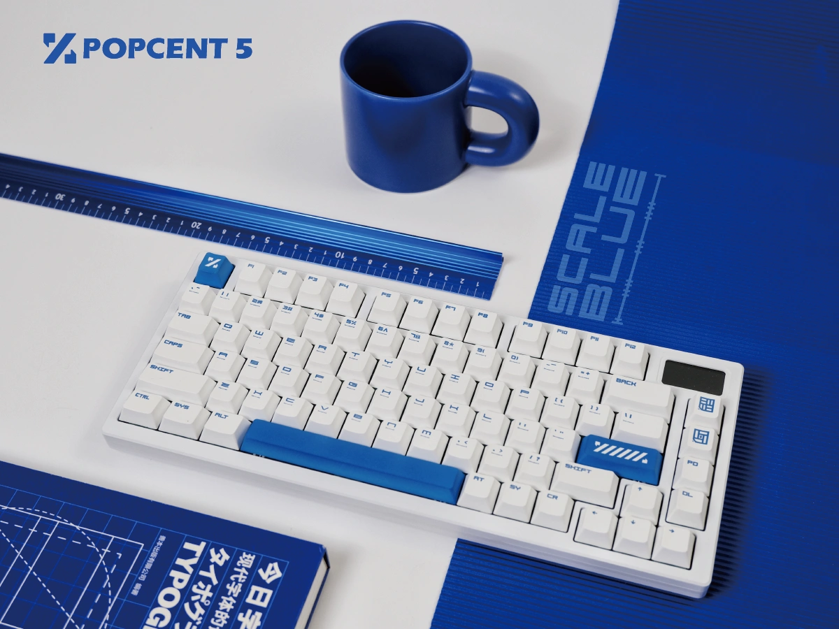 Scale Blue mechanical keyboard with white keycaps on professional blue desk setup