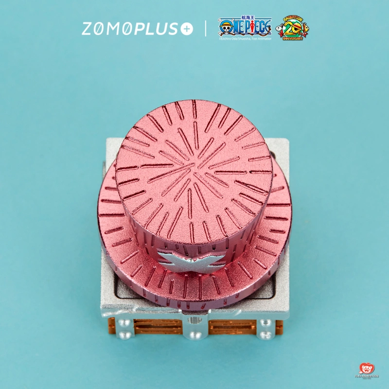 Overhead view of Chopper aluminum keycap displaying pink striped hat top pattern and wooden base construction