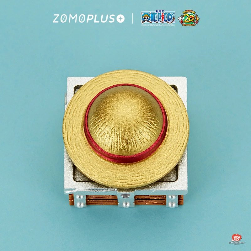 Top view Luffy's straw hat keycap showing red ribbon and texture detail