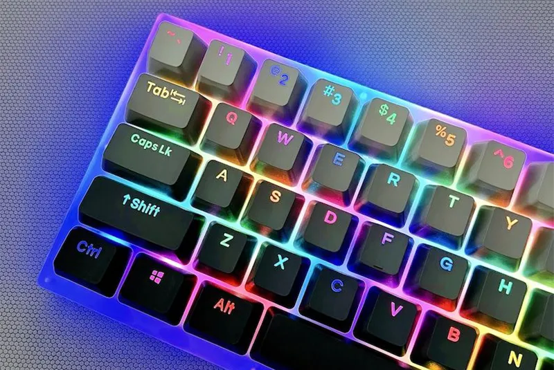 Nuclear Power Profile Keycaps: The RGB Innovation Guide (2026) Close-up of shine-through legend keycaps with RGB backlighting showing clear plastic letters and uneven glow