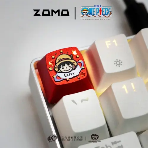 ZOMOPLUS One Piece Chibi Luffy metal artisan keycap in red aluminum with backlit glow on mechanical keyboard