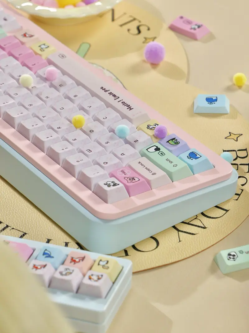 Cute Cartoon Pet Pink Cherry Profile Keycaps Angled view of Cute Cartoon Pet Pink Keycaps on a keyboard showing pastel colors and cartoon illustrations.