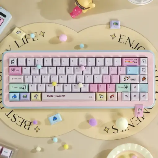 Cute Cartoon Pet Keycaps Top View Cute cartoon pet pink keycaps set installed on a compact keyboard showing animal novelty keys and pastel colors.