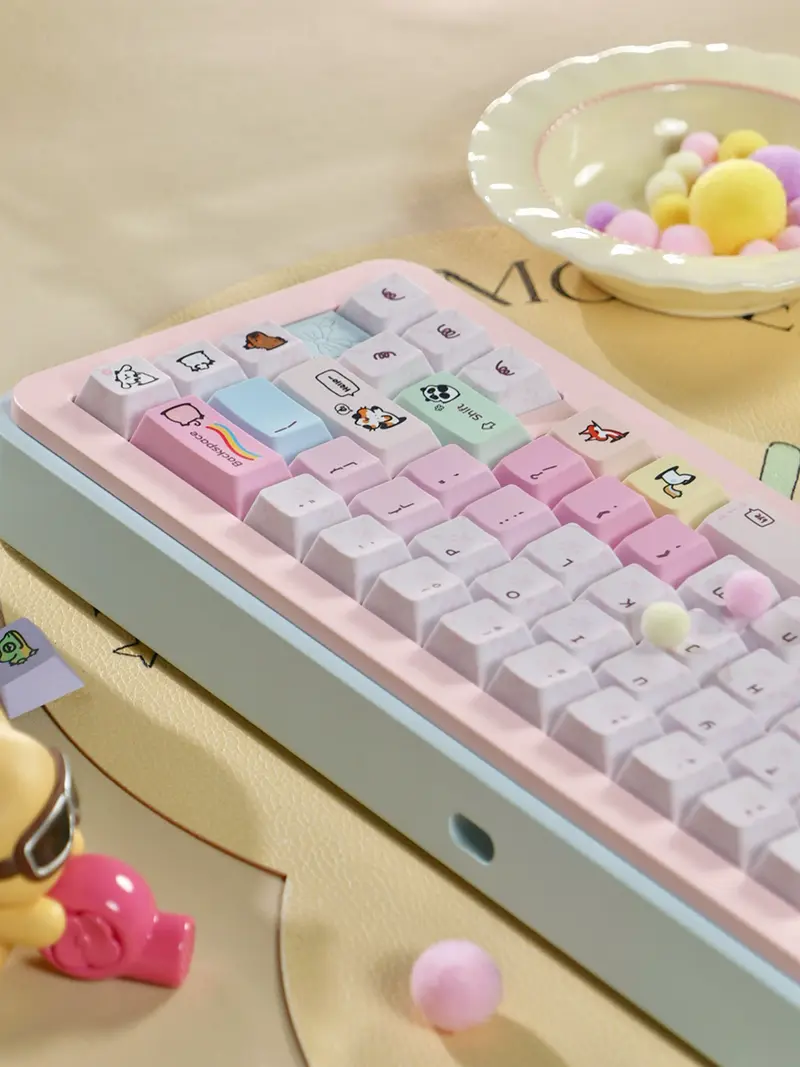 Cute Cartoon Pet Pink Cherry Profile Keycaps Close-up of pink keycaps with cartoon pet designs and pastel white keys on a mechanical keyboard.