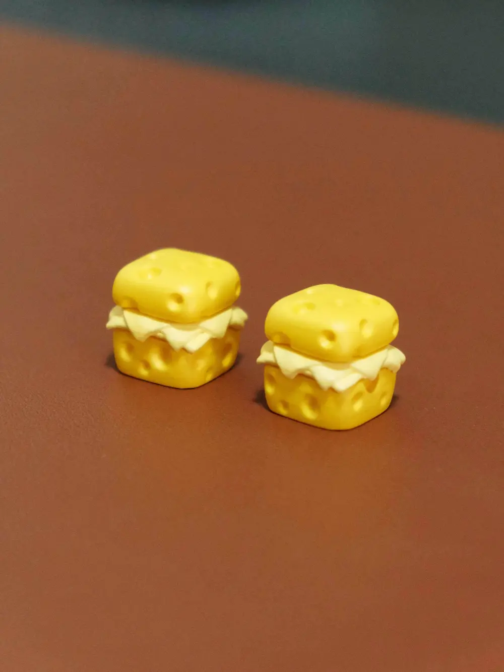 Cute Cheese Magnetic 3D Printed Resin Artisan Keycap Two cute cheese artisan keycaps made of resin with Swiss cheese hole details.