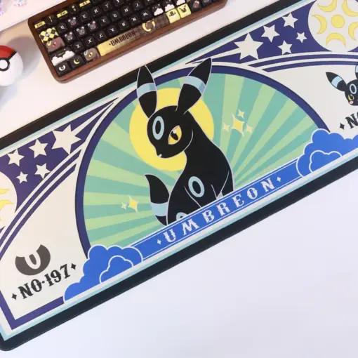 Pokemon Umbreon Large Gaming Desk Mat with No 197 design and celestial patterns on a desk.