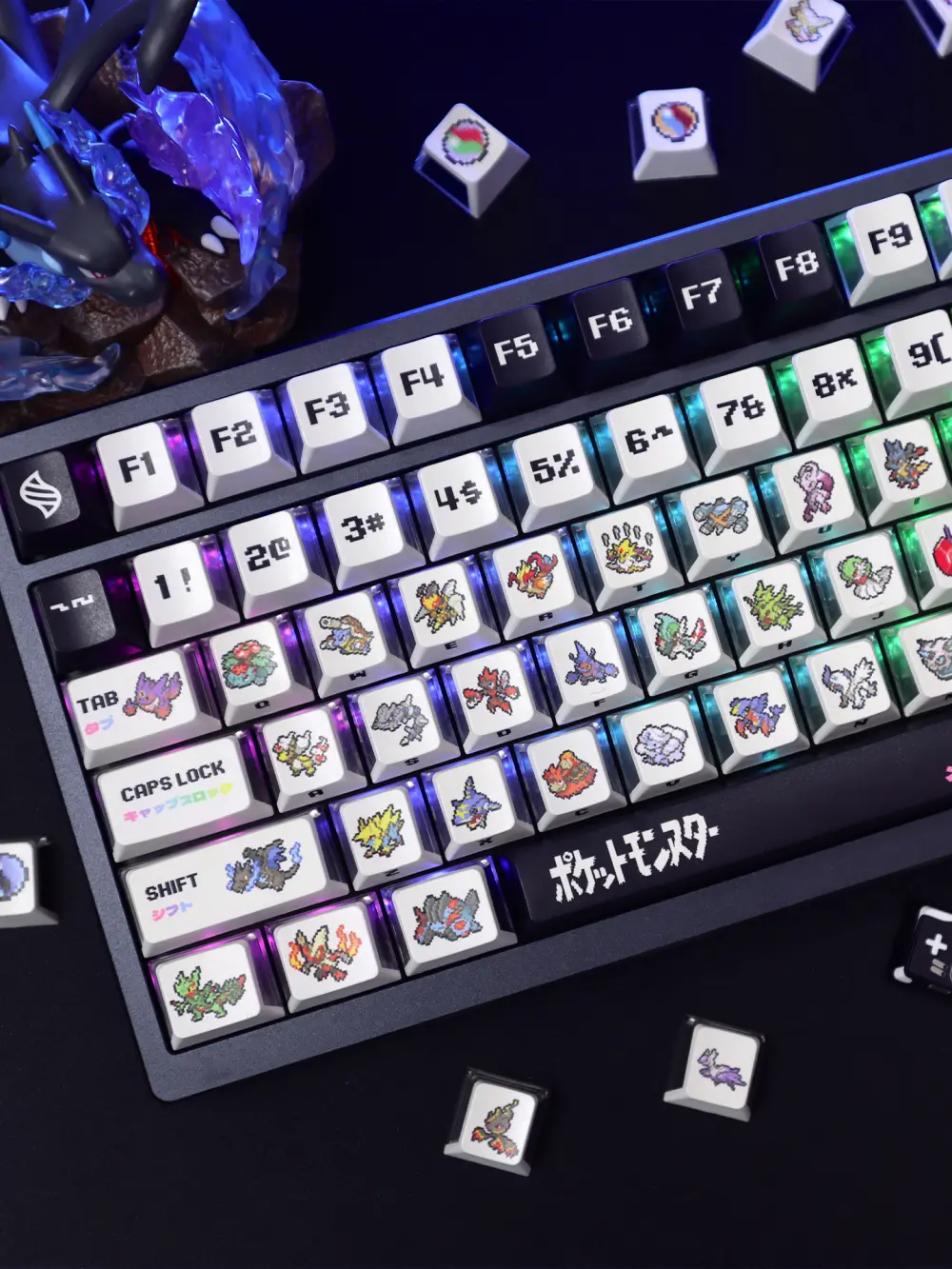 Top-down view of Pokemon Mega Evolution Keycaps with RGB lighting glowing through translucent sides.