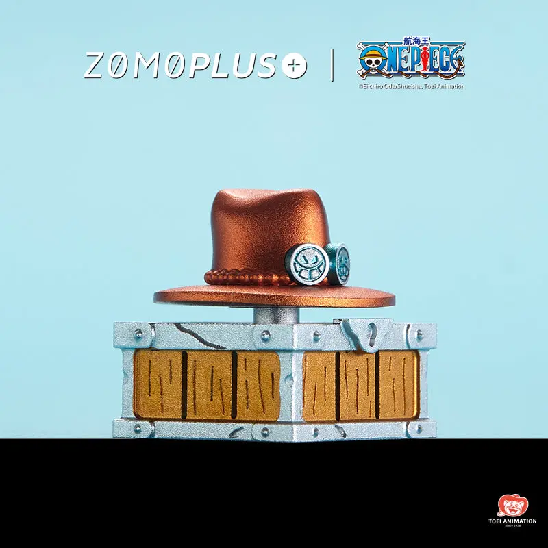 Detailed view of the ZOMOPLUS One Piece Ace rotating hat keycap with treasure chest design.